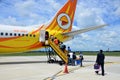 Thai people passenger walking entrance airplane at Trang Airport