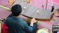 Thai people playing the ranat ek is a Thai musical instrument