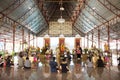 Thai people praying and rite redeem offering with a vow to Ai Kai Kuman Thong in Wat Chedi