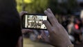 Thai people take picture by mobile phone in tribute to King Rama IX at the Temple of the Emerald Buddha