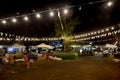 Thai people travel and shopping at market fair in night time