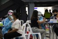 Thai people wait queue with social distancing for meet doctor and nurse inject vaccine Corona virus while Coronavirus COVID 19