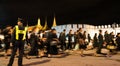 Thai people walking into Grand Palace to paying respect to the late King Bhumibol Adulyadej at night.