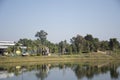 Thai people walking running jogging exercise in morning at Queen Sirikit Public Park in Udon Thani, Thailand