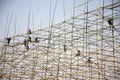 Thai people worker build bamboo boat in the festival of Illuminated Boat Procession or Lai Reua Fai and travelers people looking