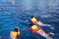 Thai photo of people snorkeling in tropical waters in Chang island Thailand. Scuba diving, snorkeling and see the fish.Diving,