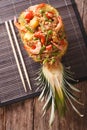 Thai pineapple stuffed with rice, shrimp, chicken and vegetables