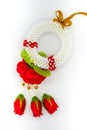 Thai plastic garland decorated with fabric red rose isolated on Royalty Free Stock Photo
