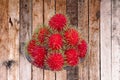 Red rambutan are edible in the serving dish.