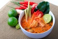 Thai Prawn Soup with Lemongrass (Tom Yum Goong) On Brown Cloth Background.