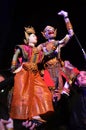 Thai professional puppeteer or Puppet master manipulate playing acting ancient puppets toy or antique marionette on stage for show
