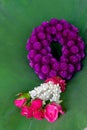 thai purple color garland on lotus green leaf