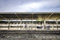 Thai Railways employees push cars along the platform to clean trains at Bangkok Hua Lamphong Railway Station, Thailand