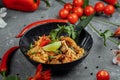 Thai rice with chicken. Thai dish of rice, chicken, Yalta onion, corn, pineapple, tomato, soy sauce, chili paste, cilantro, lime, Royalty Free Stock Photo