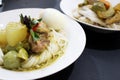 Thai rice flour noodles put beside chicken green curry Royalty Free Stock Photo