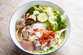 Thai rice vermicelli noodle with clear soup and fresh vegetable set with lemon sprouts bean pepper chili sauce Thai traditional Royalty Free Stock Photo