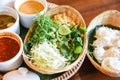 Thai rice vermicelli noodle with soup curry sauce and fresh vegetable set - Thai traditional menu Royalty Free Stock Photo