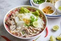 Thai rice vermicelli noodle with spicy soup and fresh vegetable set with lemon sprouts bean pepper chili sauce Thai traditional Royalty Free Stock Photo