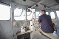 Thai river Ferry boat captain,from Wat Arun to opposite viewpoint side Royalty Free Stock Photo