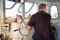 Thai river Ferry boat captain,from Wat Arun to opposite viewpoint side Royalty Free Stock Photo