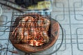 Thai river prawns grilled over charcoal grill Grilled on a BBQ Thai iron grill . Giant grilled lobster cook on charcoal stove at T