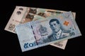 Thai and Russian money with black background