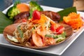 Thai Sausage with Som Tum Salad Royalty Free Stock Photo