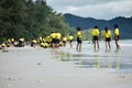 Thai schoolkids playing at the beach