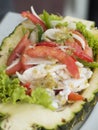 Thai seafood salad in a pineap