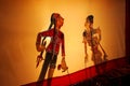 Thai Shadow puppet is folk show, it playing with shadow on shadow theatre screens Royalty Free Stock Photo