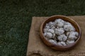 Thai Shortbread Cookies Thai Dessert, Kanom Kleeb Lum Duen on burlap fabric background