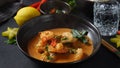 Thai shrimps red curry. Thailand tradition red curry soup with shrimps prawns and coconut milk. Royalty Free Stock Photo