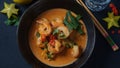 Thai shrimps red curry. Thailand tradition red curry soup with shrimps prawns and coconut milk. Royalty Free Stock Photo