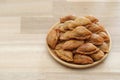 Thai snack ,Pun sib dried in a bowl on wooden background, (Thai Traditional Dessert Royalty Free Stock Photo