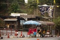 Thai soldier officer and security guard set up a checkpoint and working checking car and people journey on forest mountain at Pai