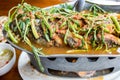 Thai sour curry with deep-fried snake head fish