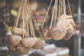 Thai souvenir. A hanging coconut shell by the local Thai people hanging at the shop for display. It can be used as a decoration or Royalty Free Stock Photo