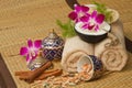 Thai spa massage setting with spa essential oil , towel, herb ,