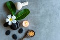 Thai Spa. Top view of white Plumeria flower setting for massage treatment and relax on black blackboard for text banner and copy s