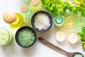 Thai Spa Treatments aroma therapy salt and nature green sugar scrub and rock massage with green orchid flower on wooden white wit