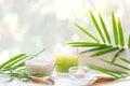 Thai Spa Treatments aroma therapy salt and sugar scrub massage with bamboo leaves with candle, Royalty Free Stock Photo