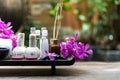 Thai Spa Treatments aroma therapy salt and sugar scrub and rock massage with orchid flower on wooden white. Healthy Concept. cop