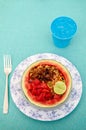 Thai spicy fried rice with crispy fried shallot serving in sweet watermelon