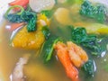 Thai spicy mixed vegetable soup with prawns, or \