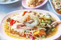 Thai spicy seafood papaya salad