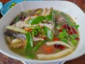 Thai Spicy seafood soup in a white bowl