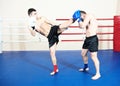 Thai sportsman fighting at boxing ring