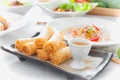 Thai spring rolls with sauce on dish Royalty Free Stock Photo