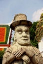 Thai statue with a hat Royalty Free Stock Photo