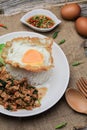 Thai Stir fried  basil with minced pork, chili and fried egg on topped rice. Royalty Free Stock Photo